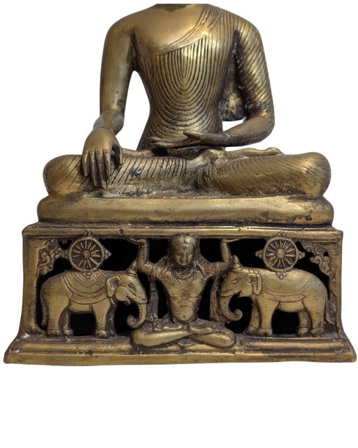 Natural aged patina on the Burmese bronze Buddha