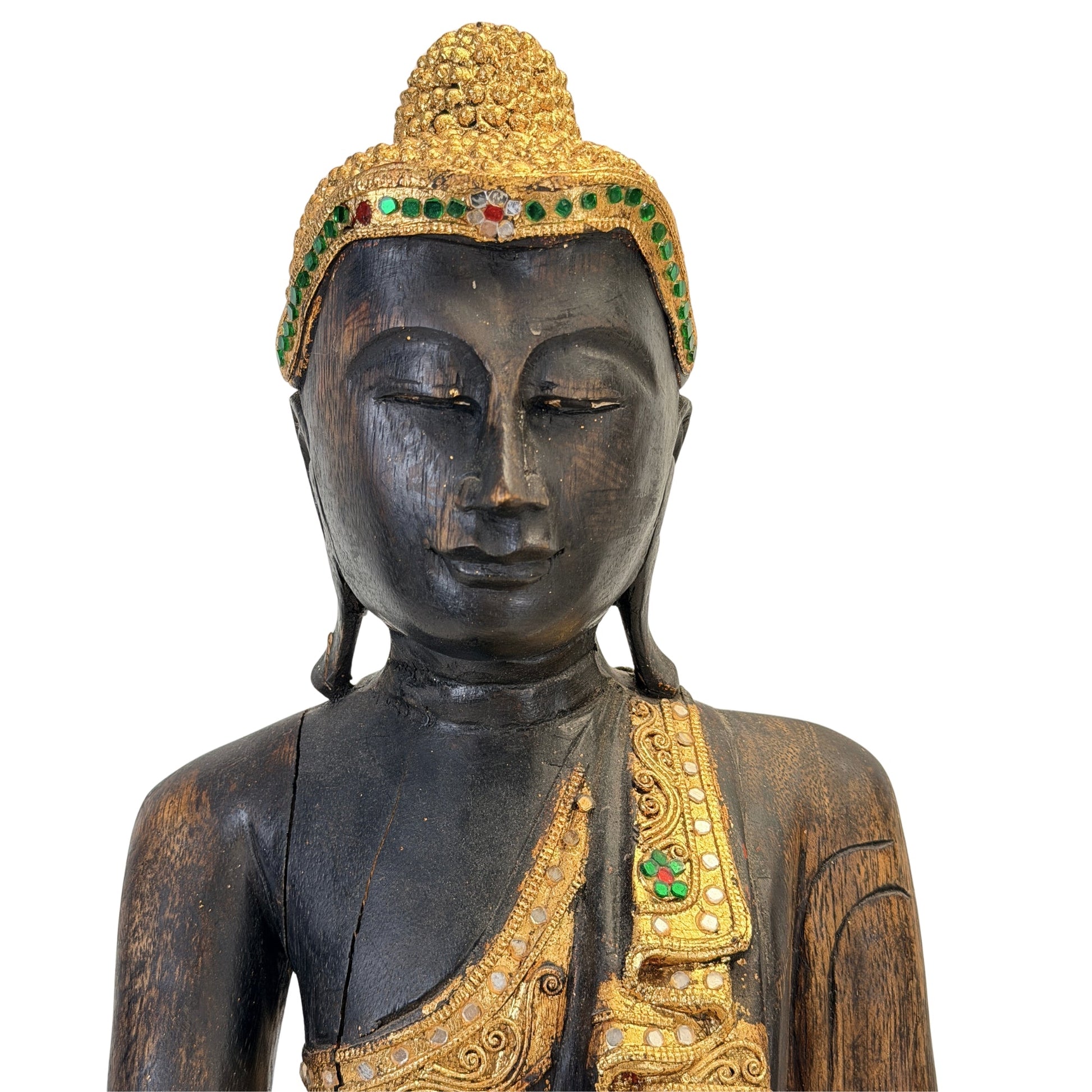 Face and gilded ushnisha of the antique Burmese Mandalay Buddha