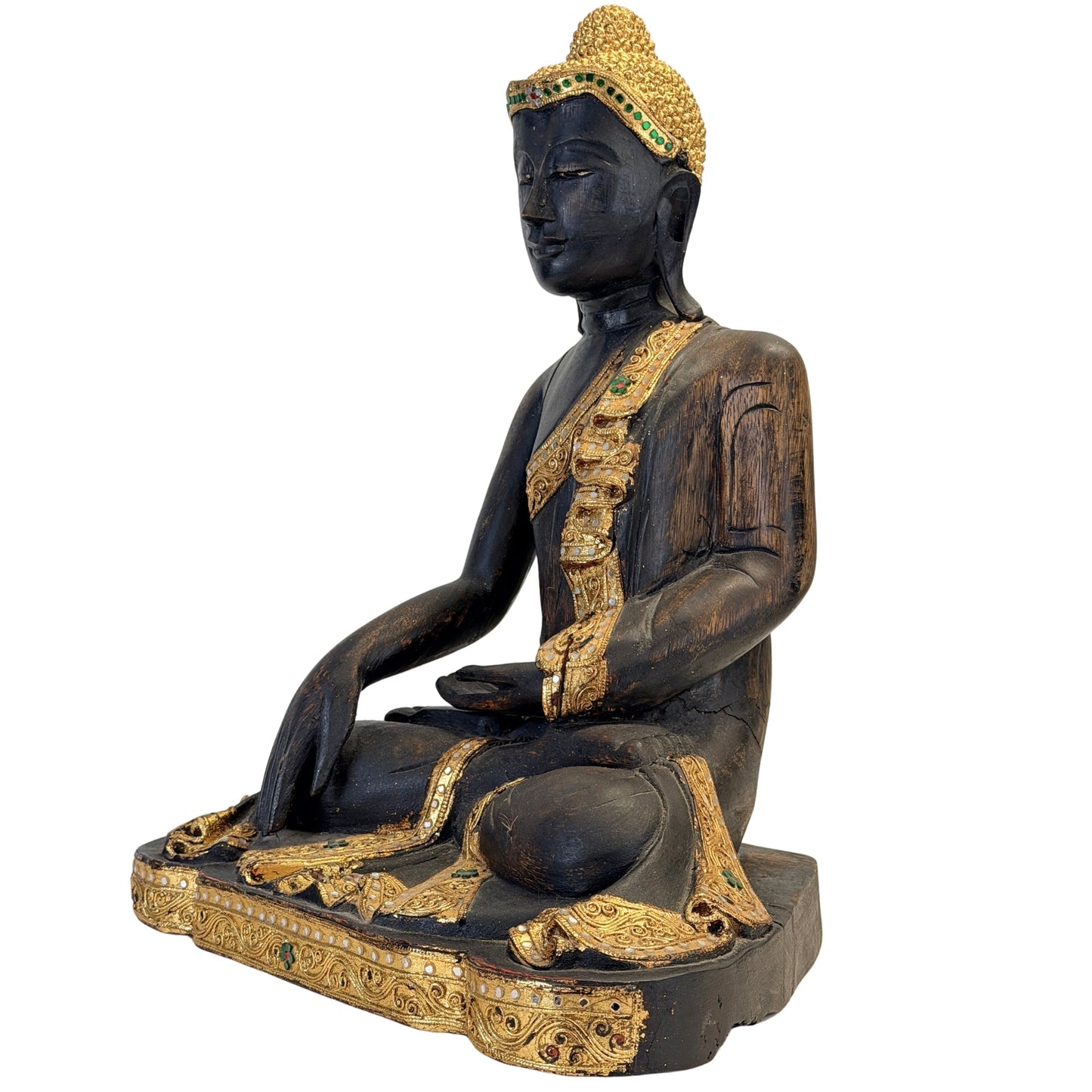 Front three-quarter view of the antique Burmese Mandalay Buddha with decorated robe