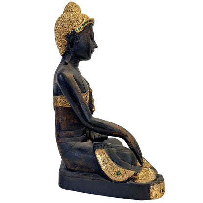 Gilded hair curls and green glass inlay on the Burmese Mandalay Buddha