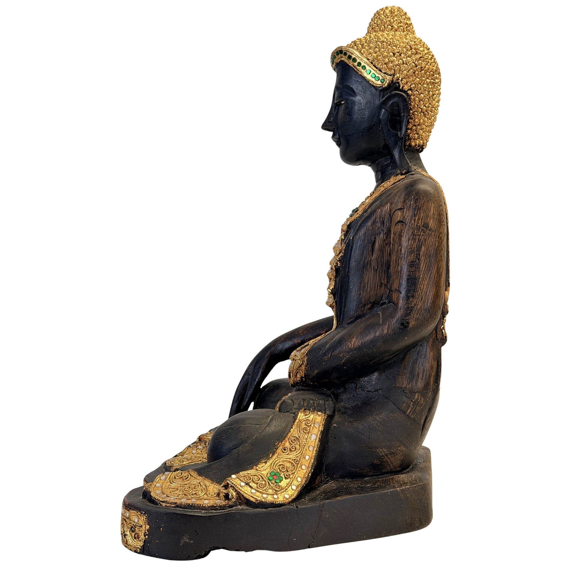 Left-side view of the seated Burmese Mandalay Buddha with historic gilding