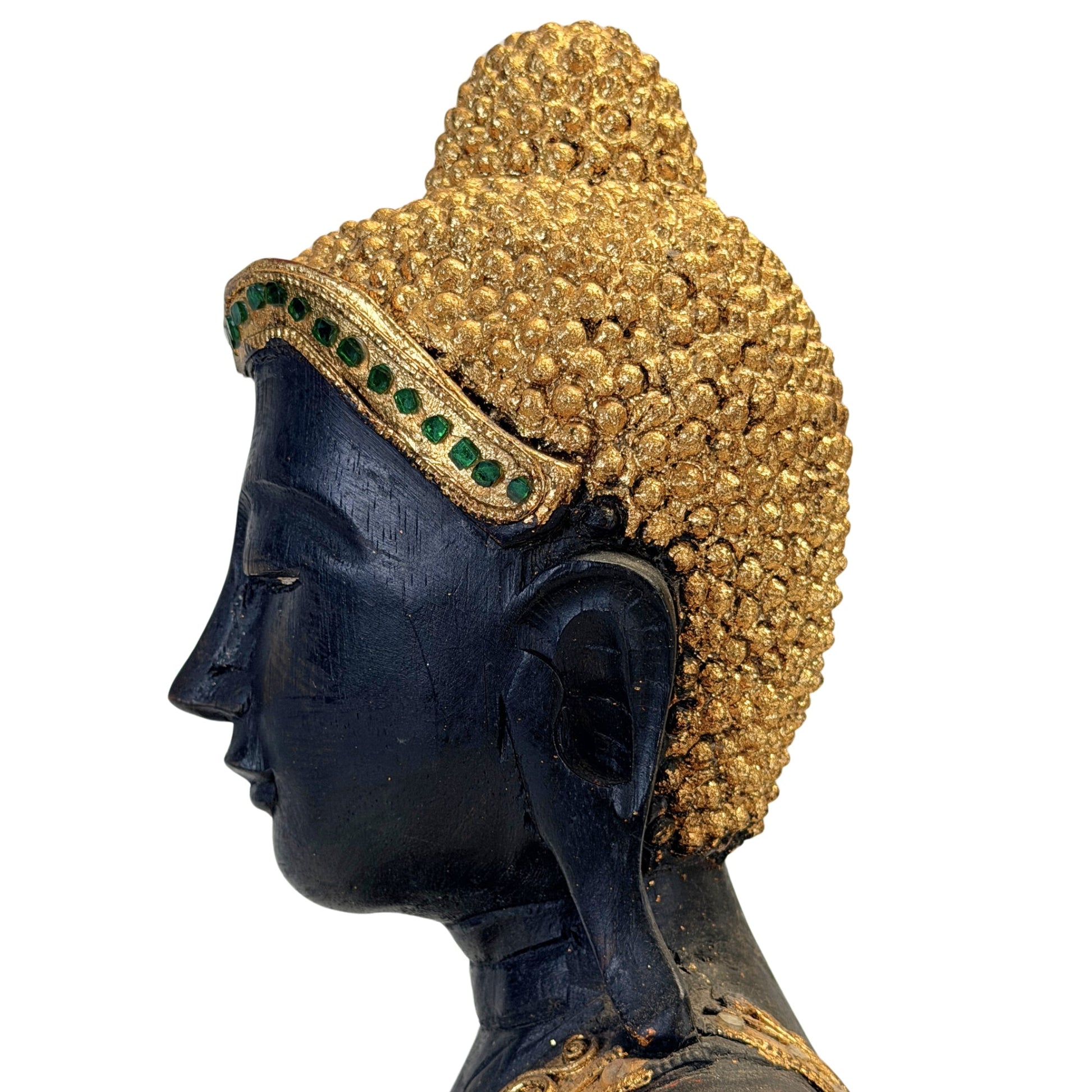 Profile and gilded ushnisha detail of the antique Burmese Mandalay Buddha