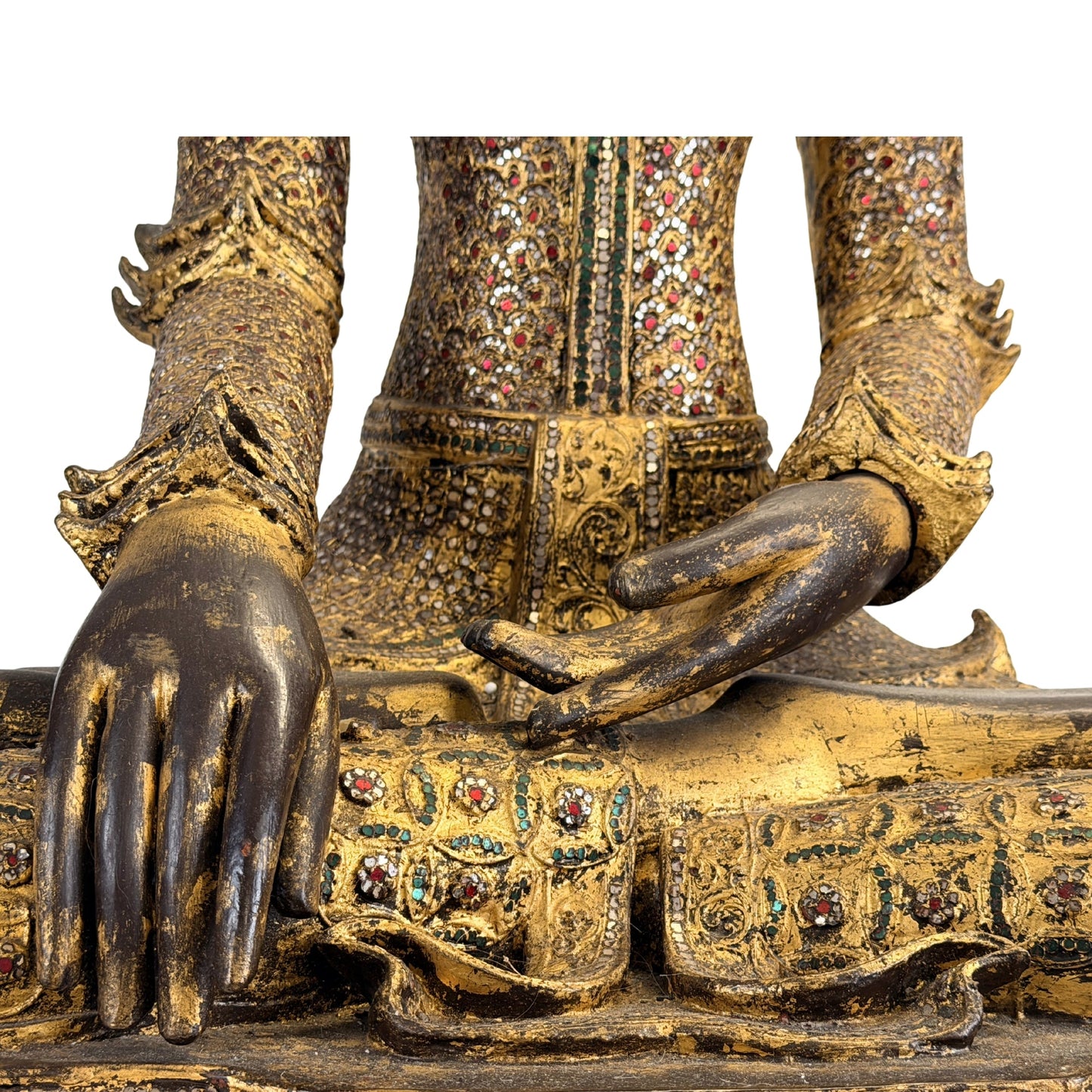 Thayo relief decoration on the antique Burmese Mandalay Buddha