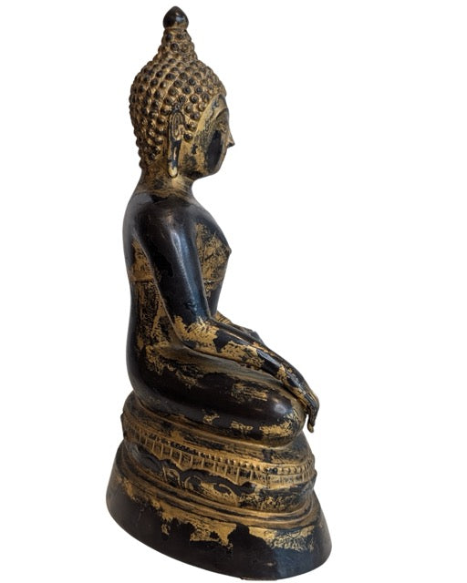 Earth-touching right hand of the Burmese bronze Buddha