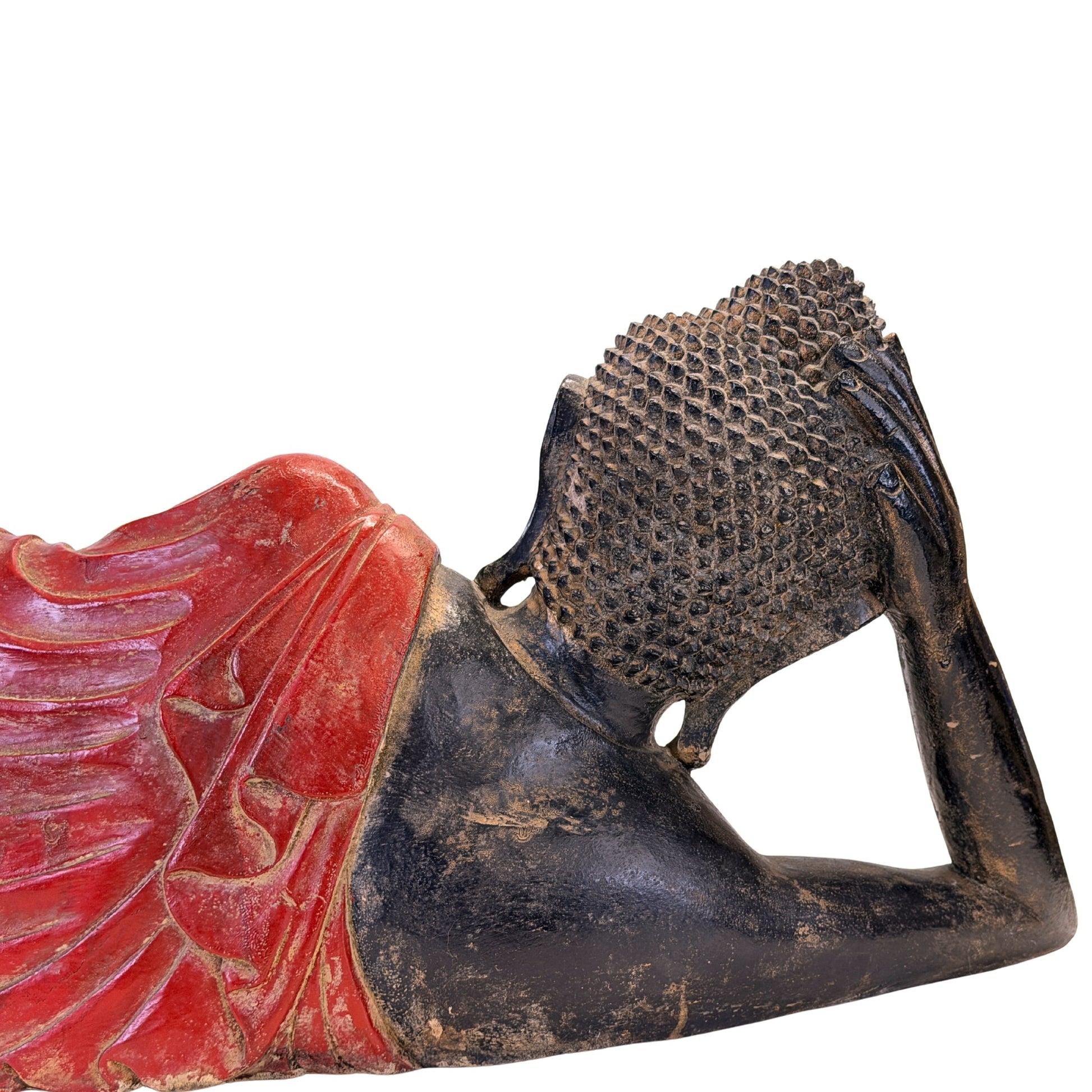 Rear detail of the head, supporting hand and hair curls of the Burmese reclining Buddha