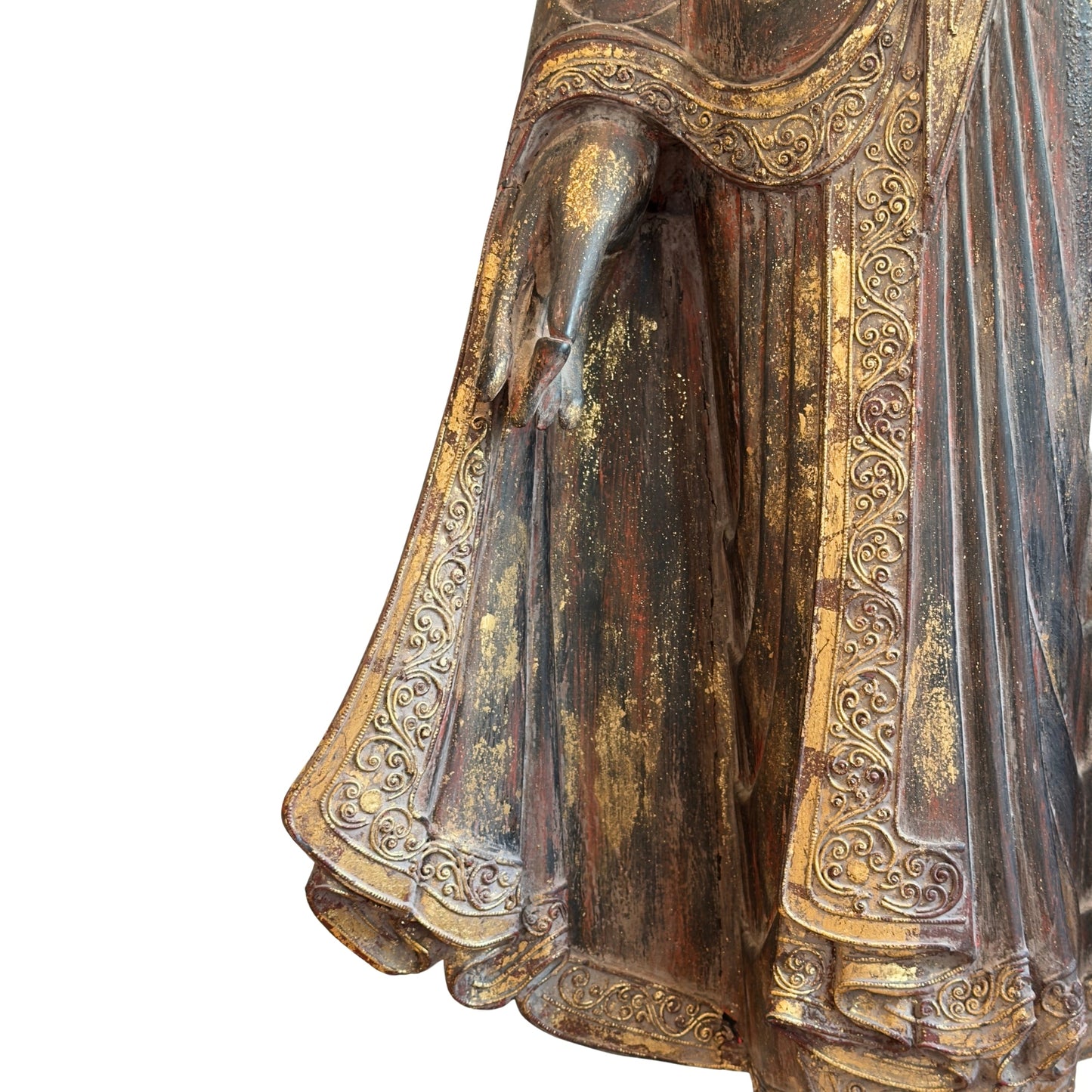 Hand-carved robe decoration on the antique Burmese standing Buddha