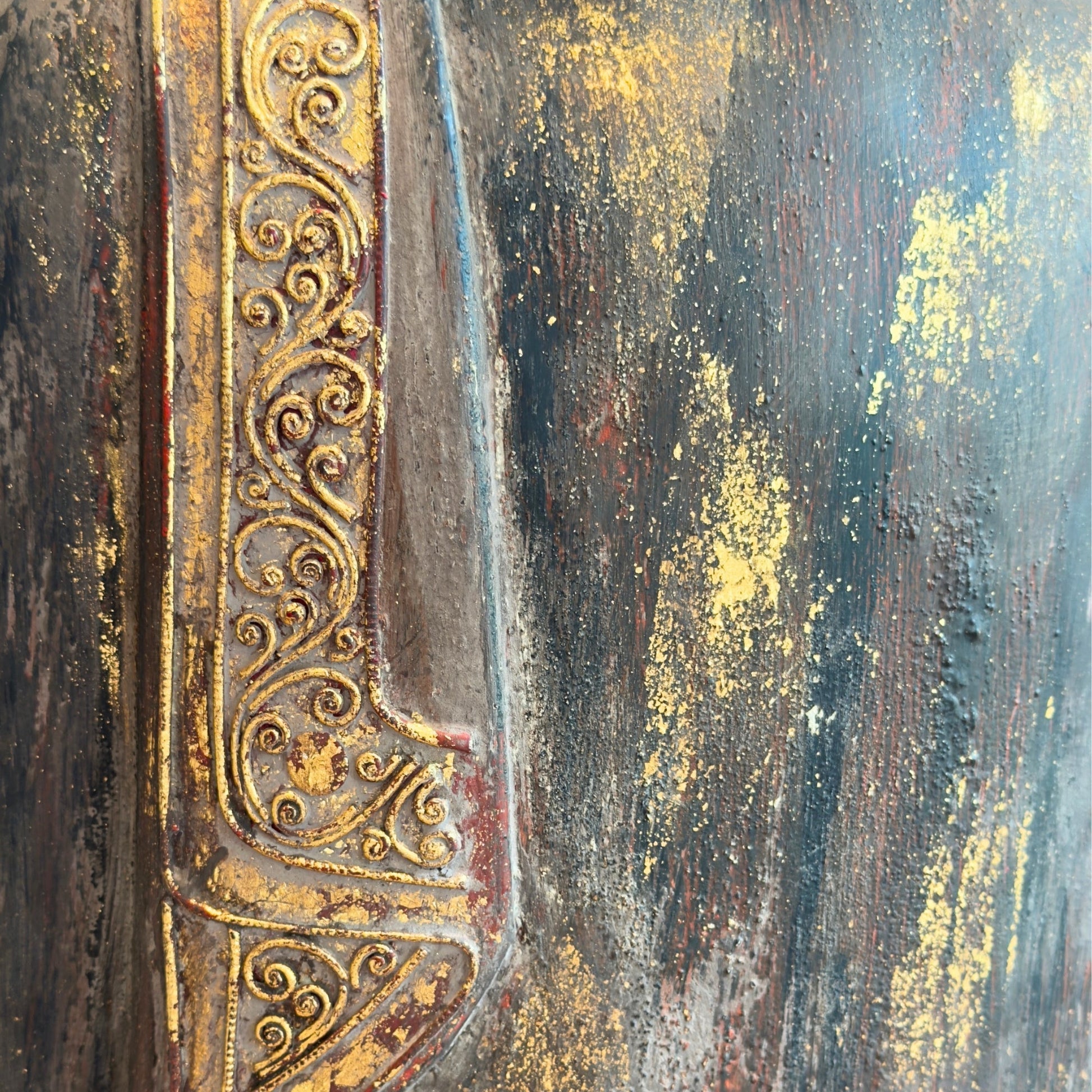 Gilding and carved robe detail on the antique Burmese standing Buddha