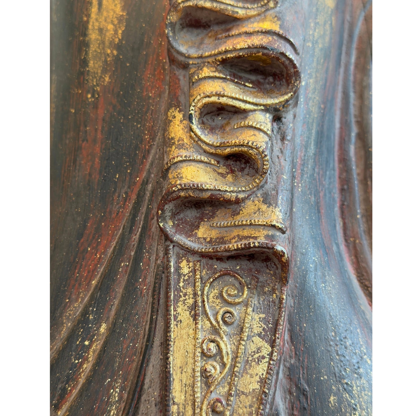 Historic gilding detail on the monumental Burmese standing Buddha