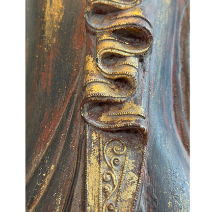 Historic gilding detail on the monumental Burmese standing Buddha