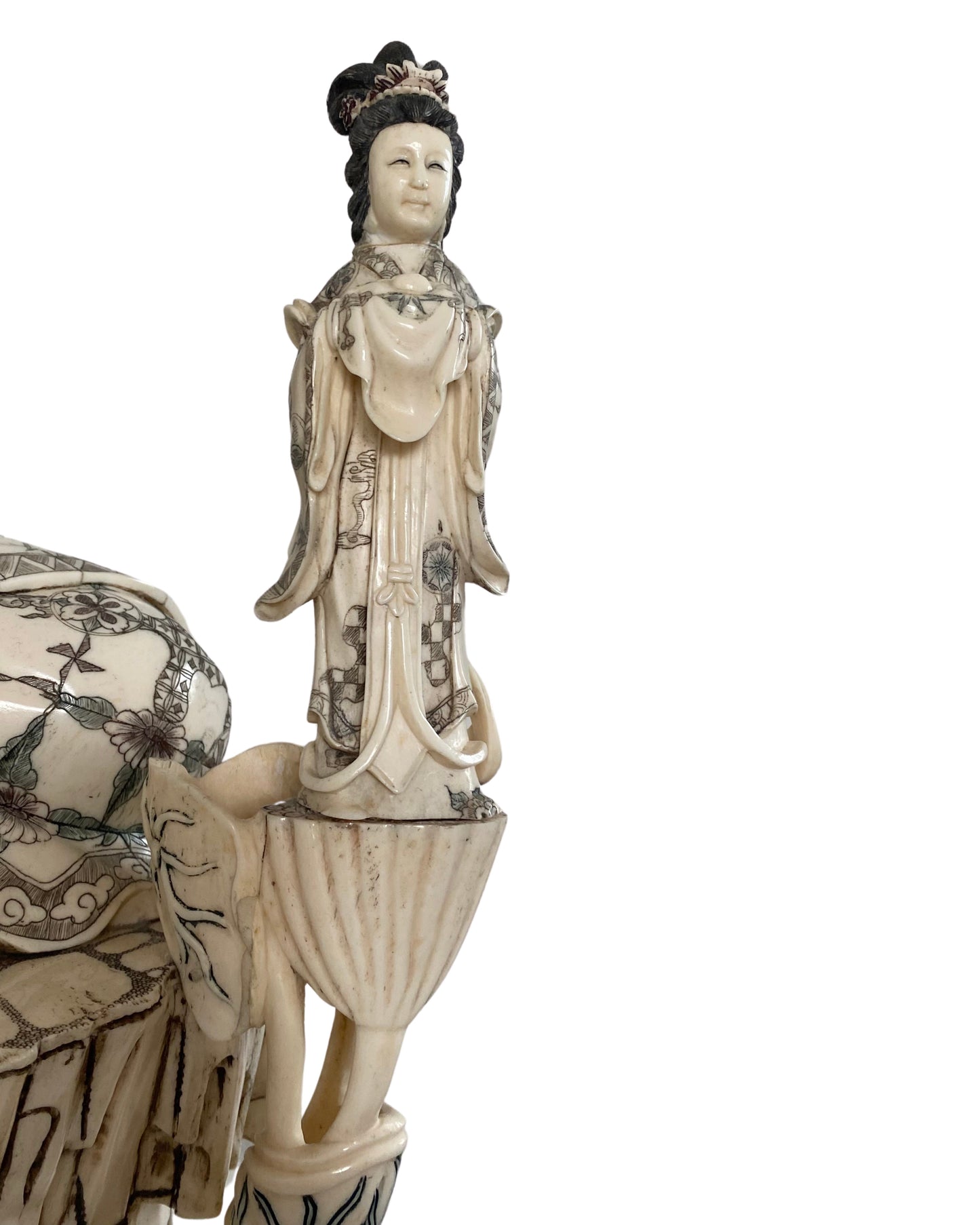 Chinese Guanyin in a traditional Buddhist sculptural composition