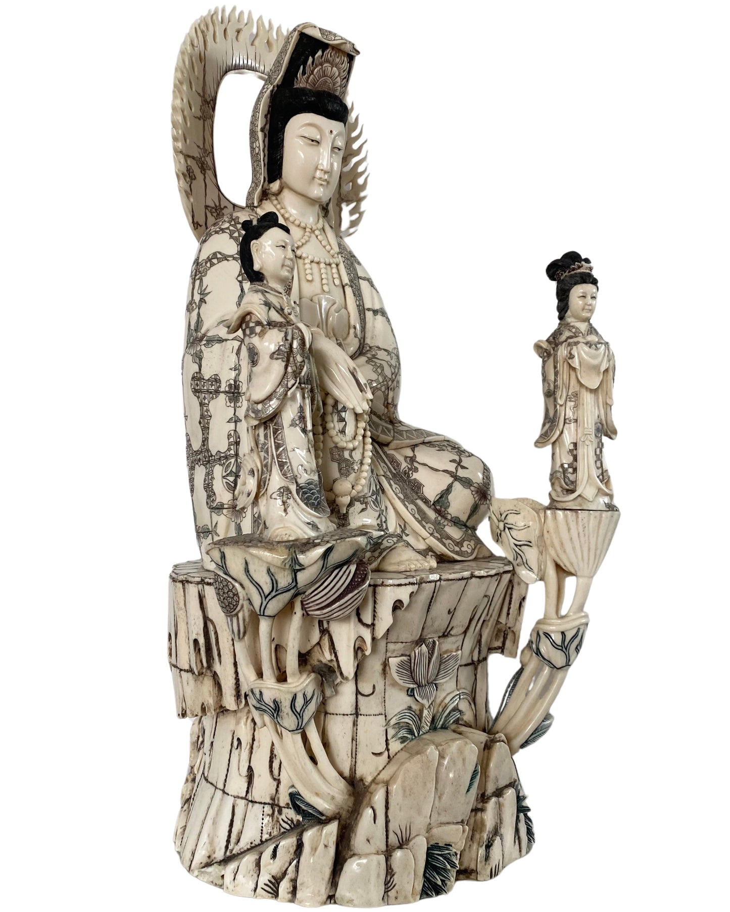 Chinese Guanyin with Shancai and Longnü in a traditional Buddhist composition