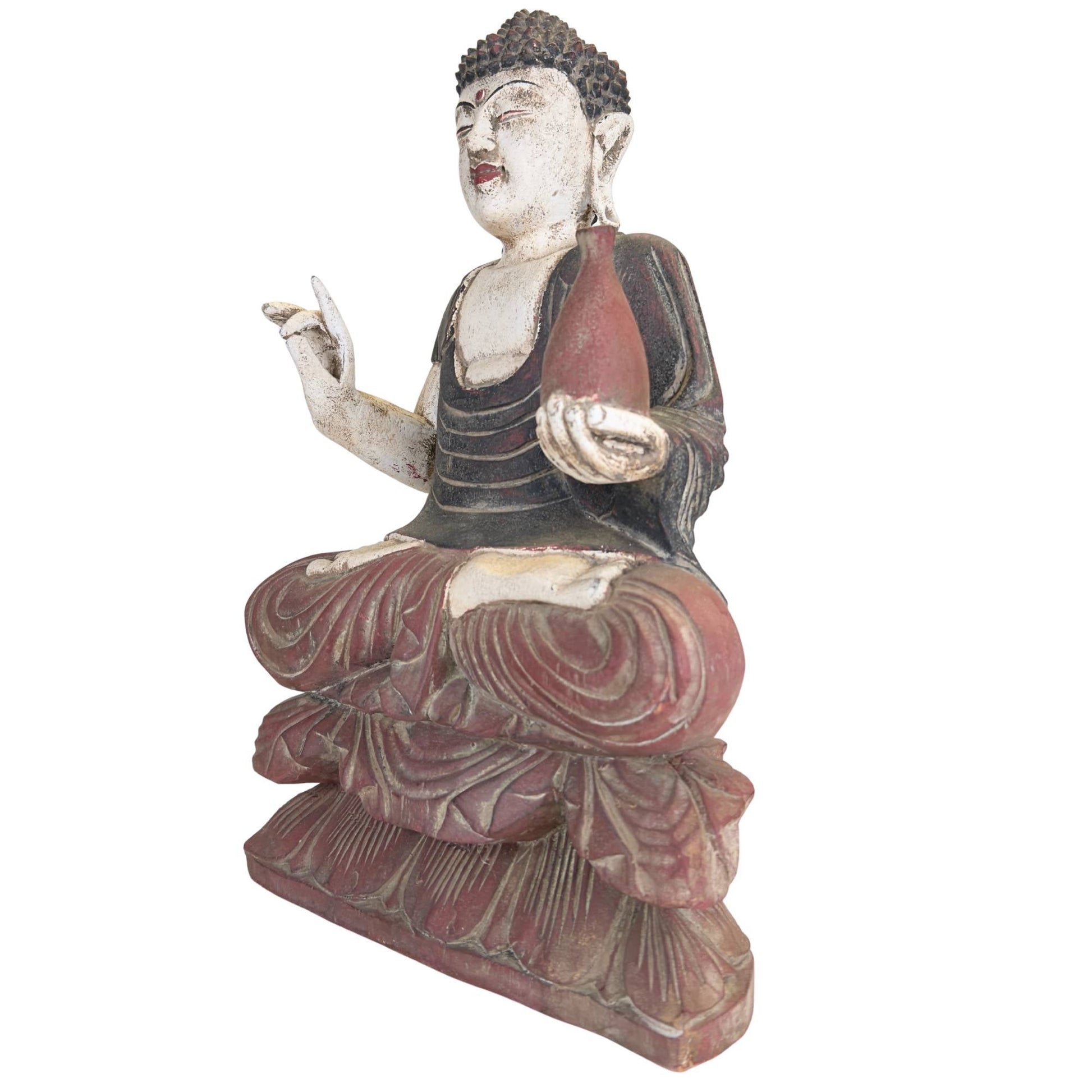 Detail van Chinees Medicijnboeddha gezicht met gesloten ogen witte beschildering en rustige meditatieve expressie