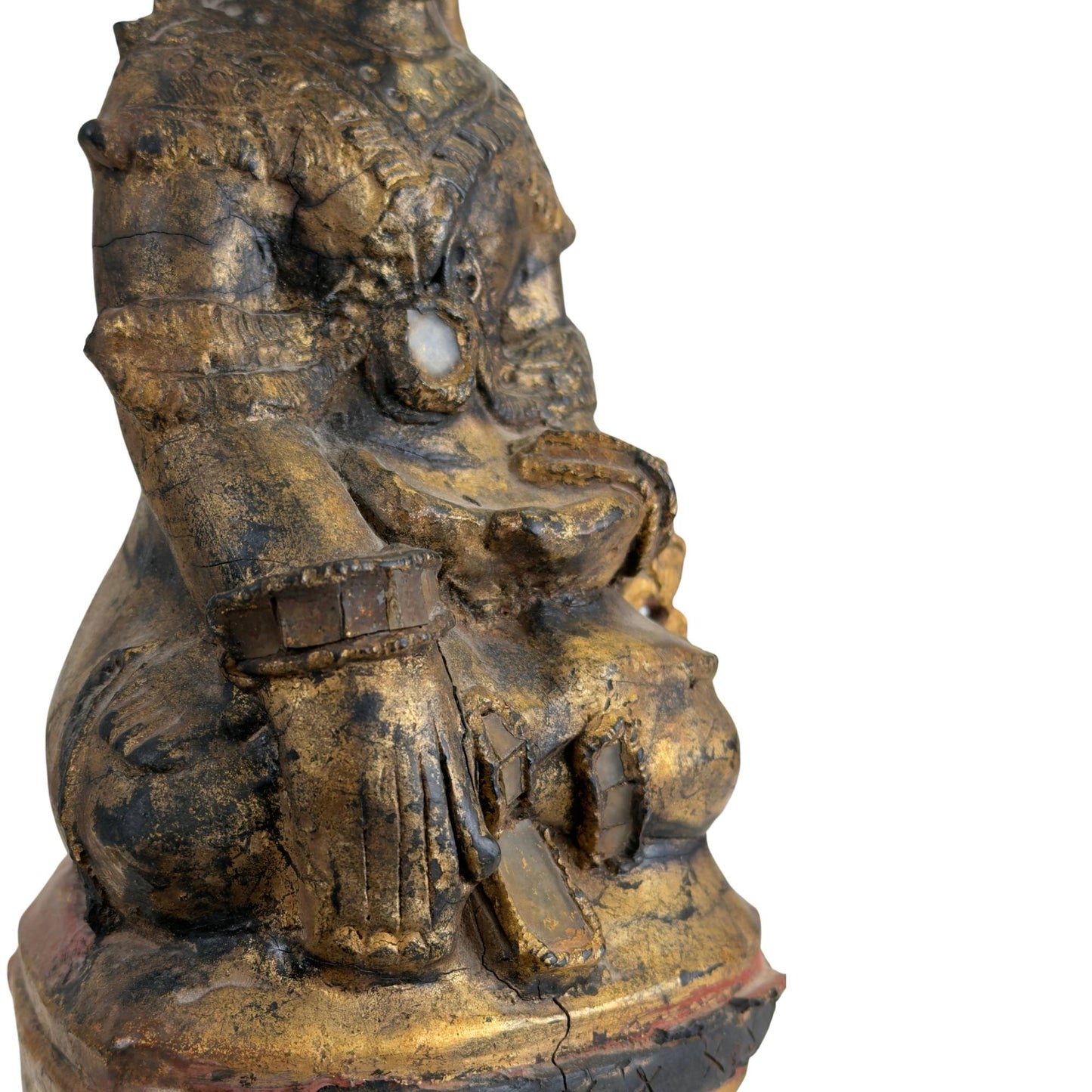 Detail van vergulding op Birmese tempelfiguur