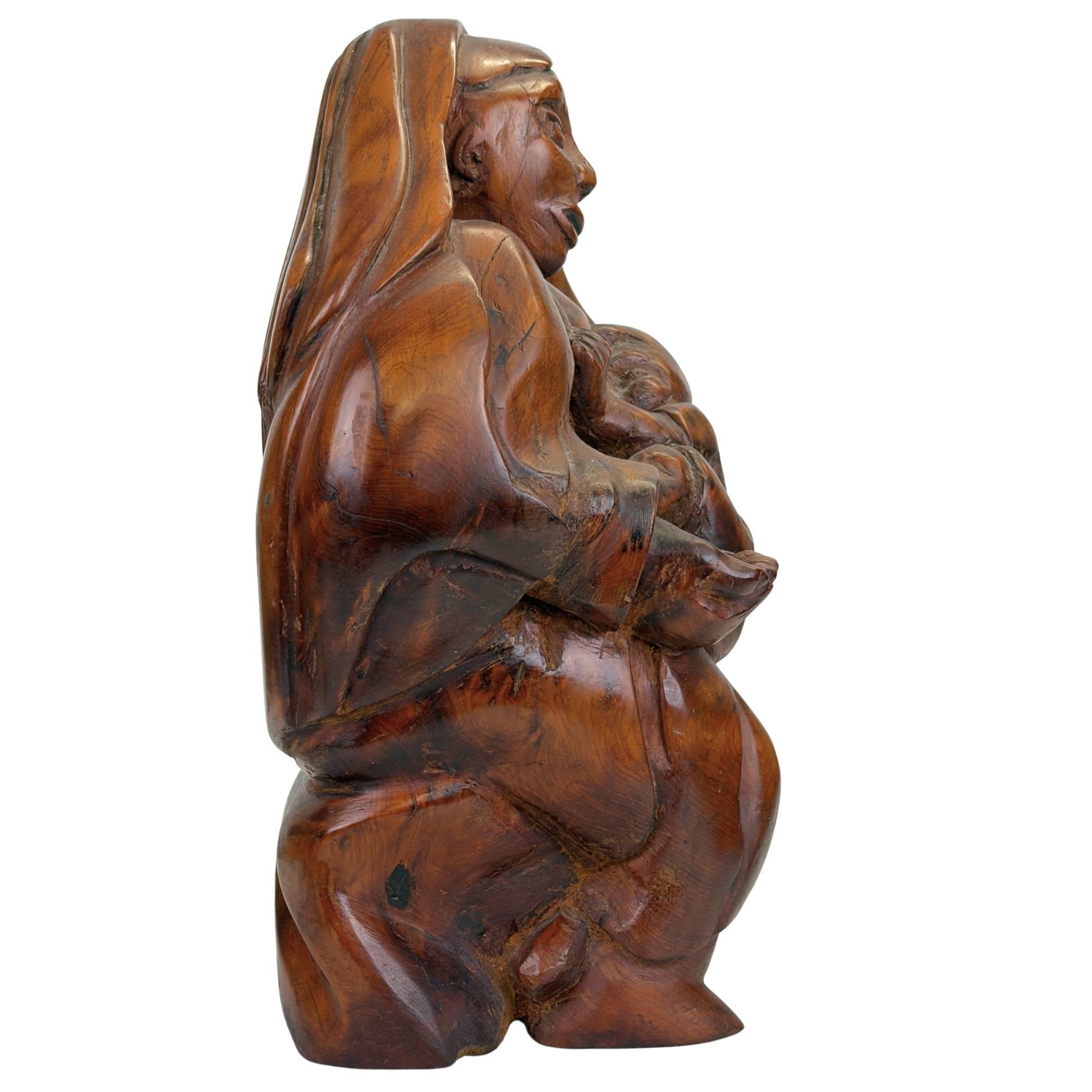 Expressieve Madonna met Kind in handgesneden volkskunst stijl