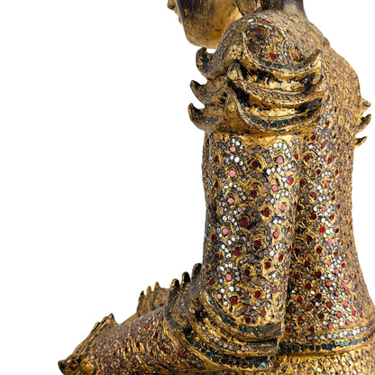 Gilt surface and age-related wear on the antique Burmese Mandalay Buddha