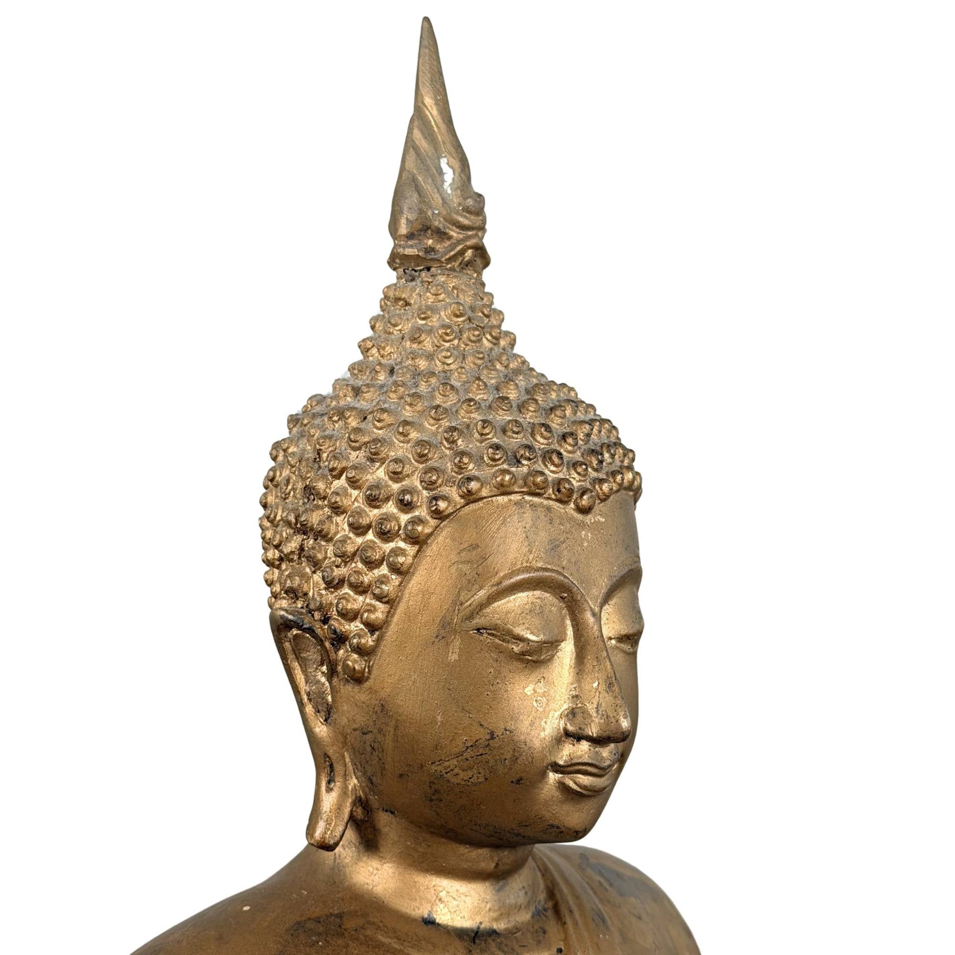 Gouden bronzen Boeddha uit Thailand met rustige gezichtsuitdrukking