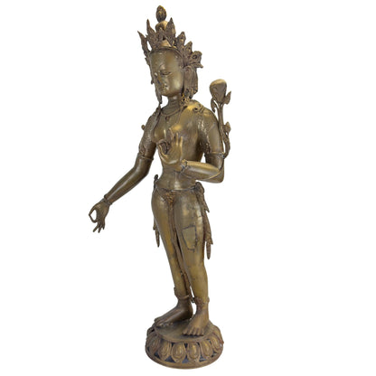 Right hand, lotus and engraved surface detail on the antique Nepalese Green Tara