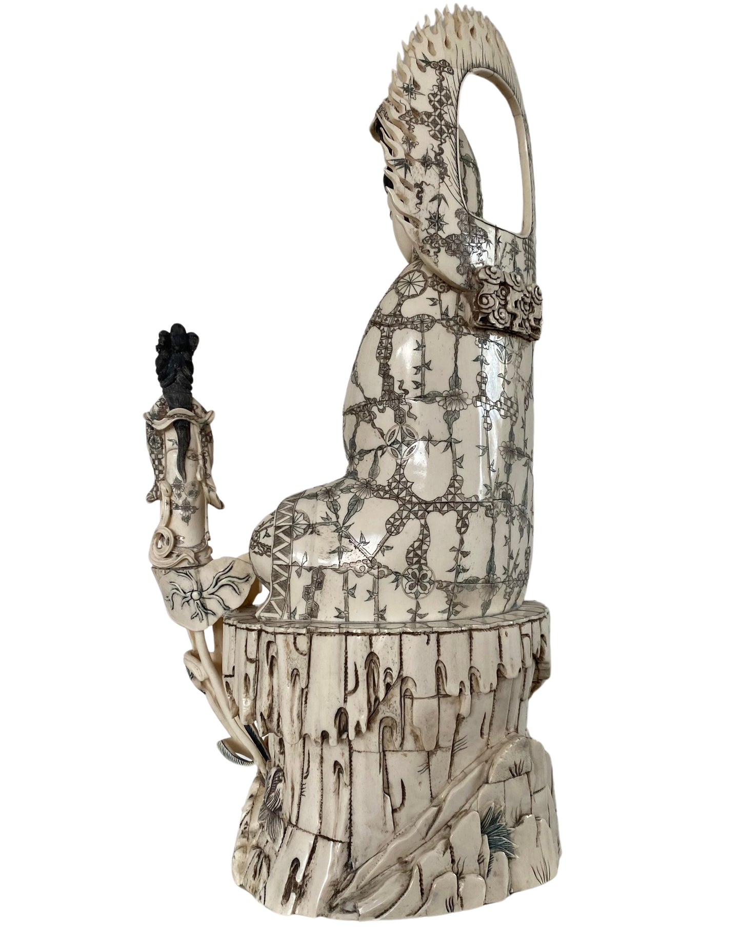 Guanyin Bodhisattva surrounded by detailed Chinese Buddhist iconography