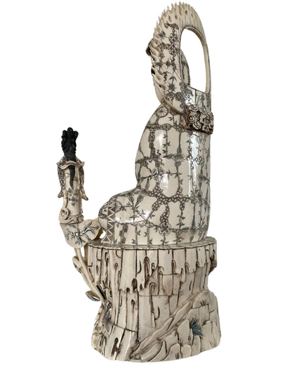 Guanyin Bodhisattva surrounded by detailed Chinese Buddhist iconography