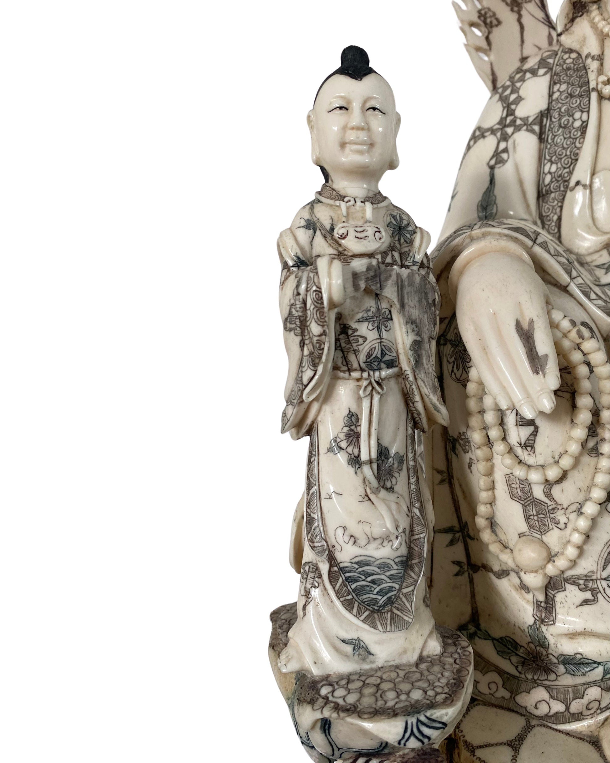 Facial detail of Guanyin in finely carved Chinese bone sculpture