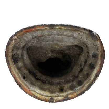 Open underside of one hollow-cast Himalayan bronze Buddha
