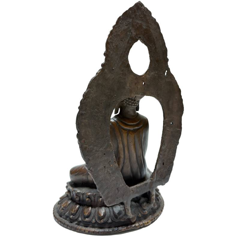 Rear angled view of Himalayan bronze Buddha and openwork aureole