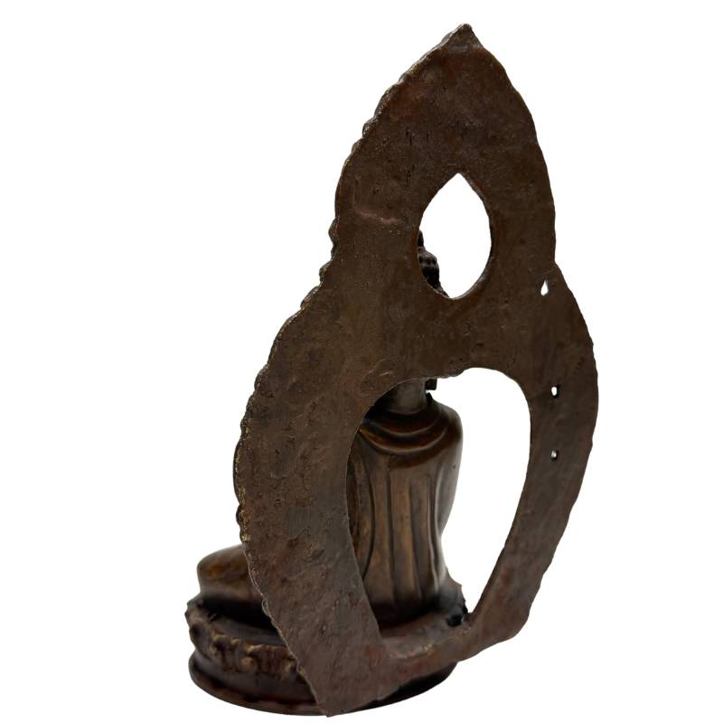 Opposite rear angle of Himalayan bronze Buddha and openwork aureole