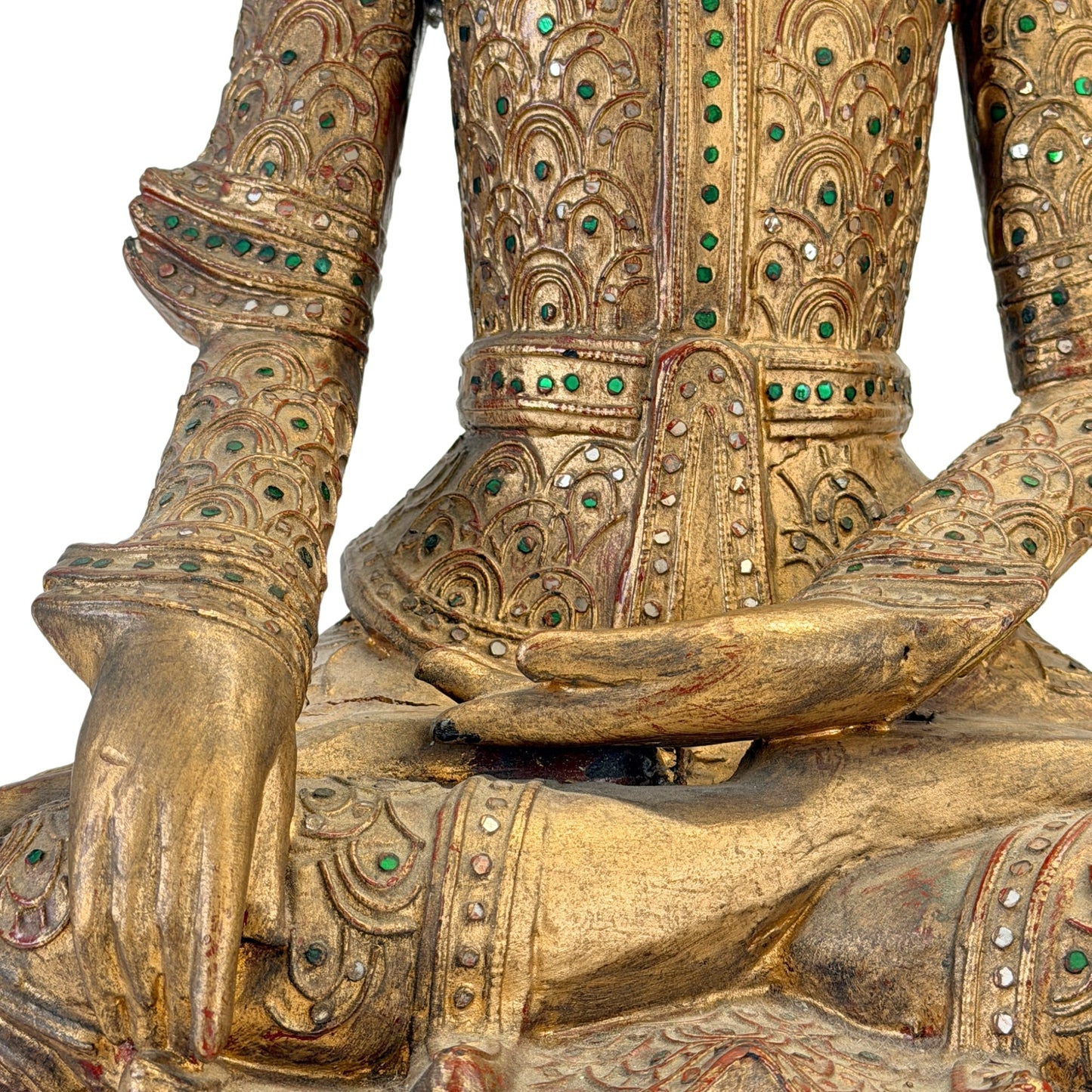 Hands, thayo relief and green glass mosaic on the Burmese Jambupati Buddha