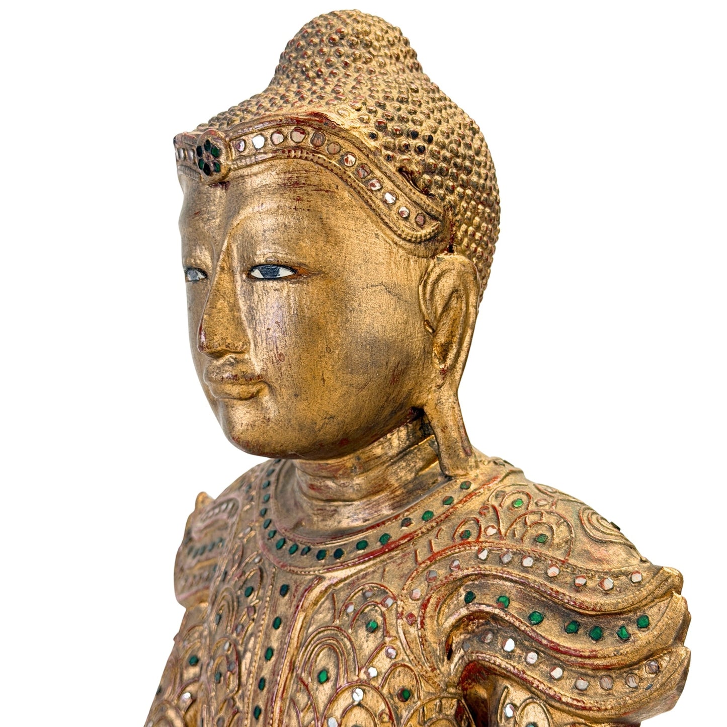 Inlaid eyes and mirror-glass headband of the Burmese Jambupati Buddha