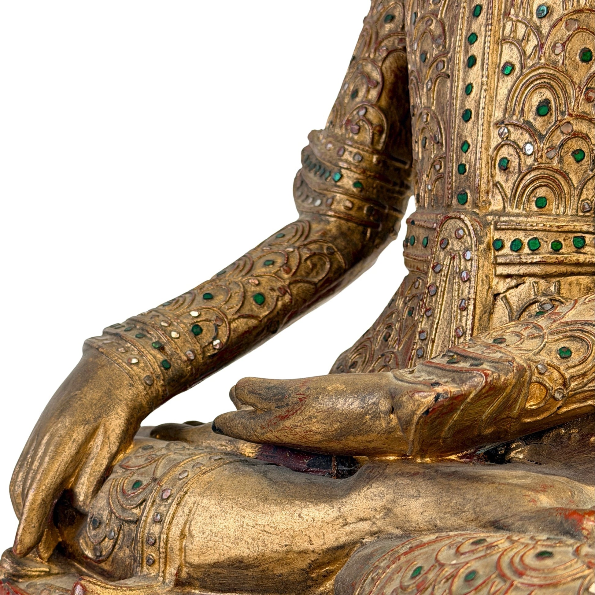 Left meditation hand and glass mosaic detail on the Burmese Jambupati Buddha