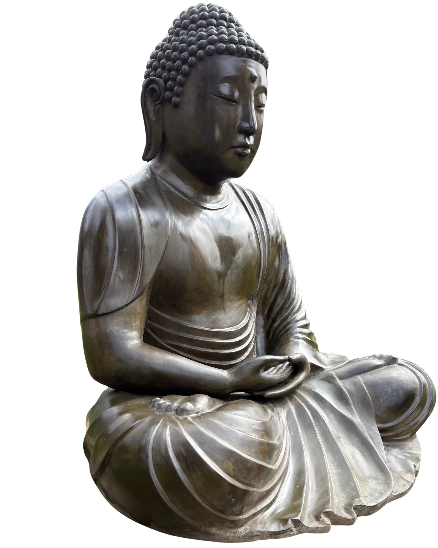 Face of the Japanese Amida Buddha with weathered bronze patina