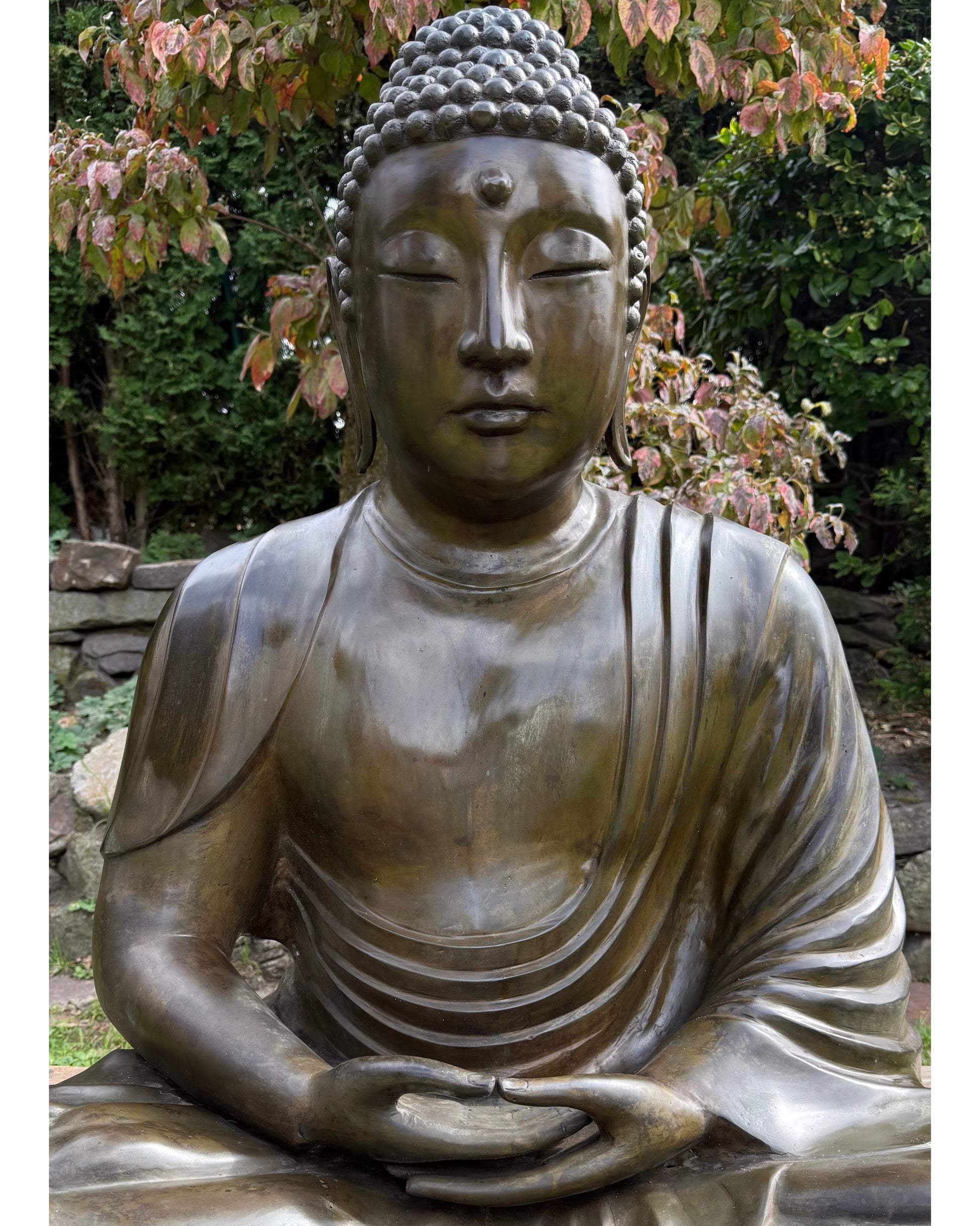 Heavy cast-bronze construction of the large Japanese Amida Buddha