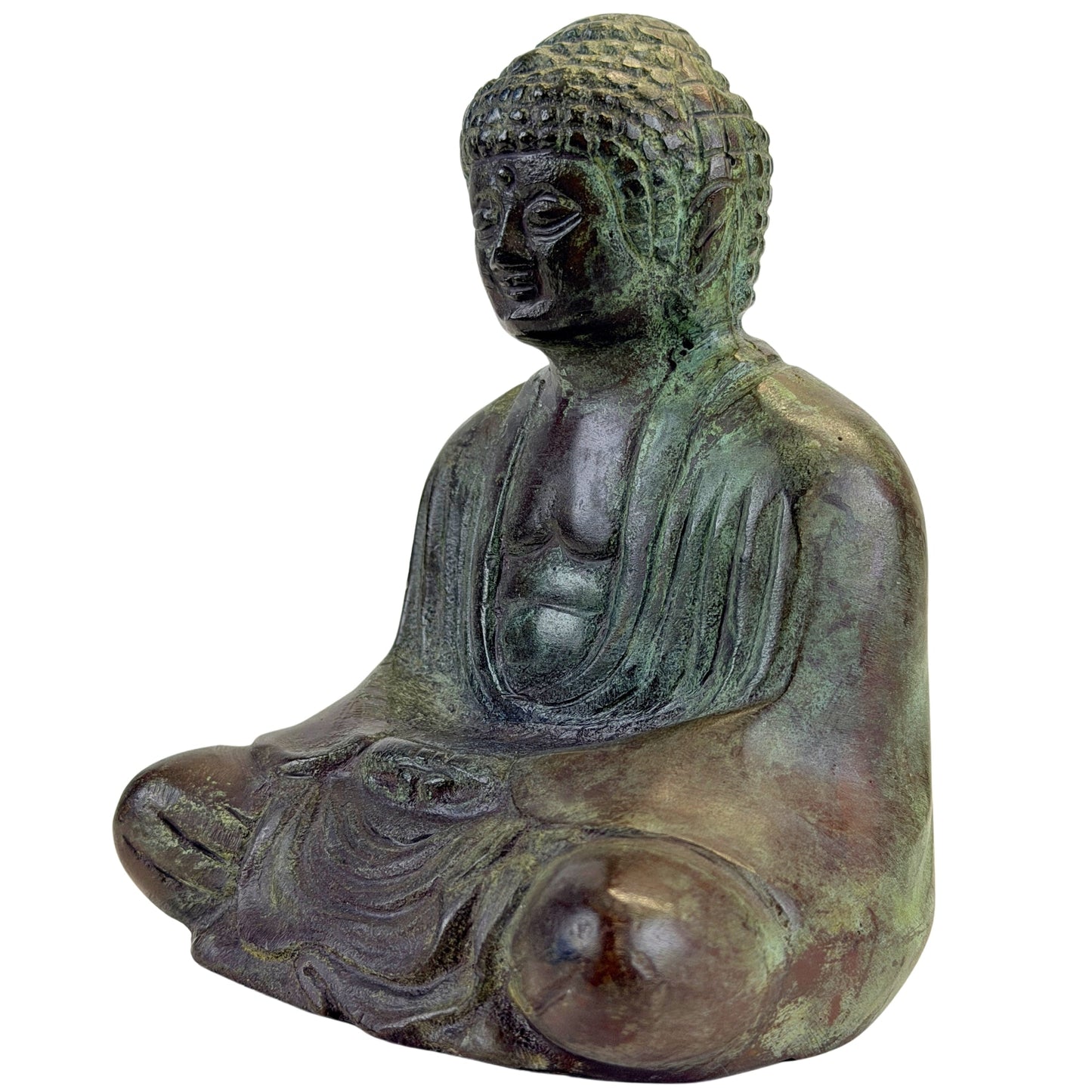 Angled front view of the Japanese meditation Buddha with robe folds and crossed legs