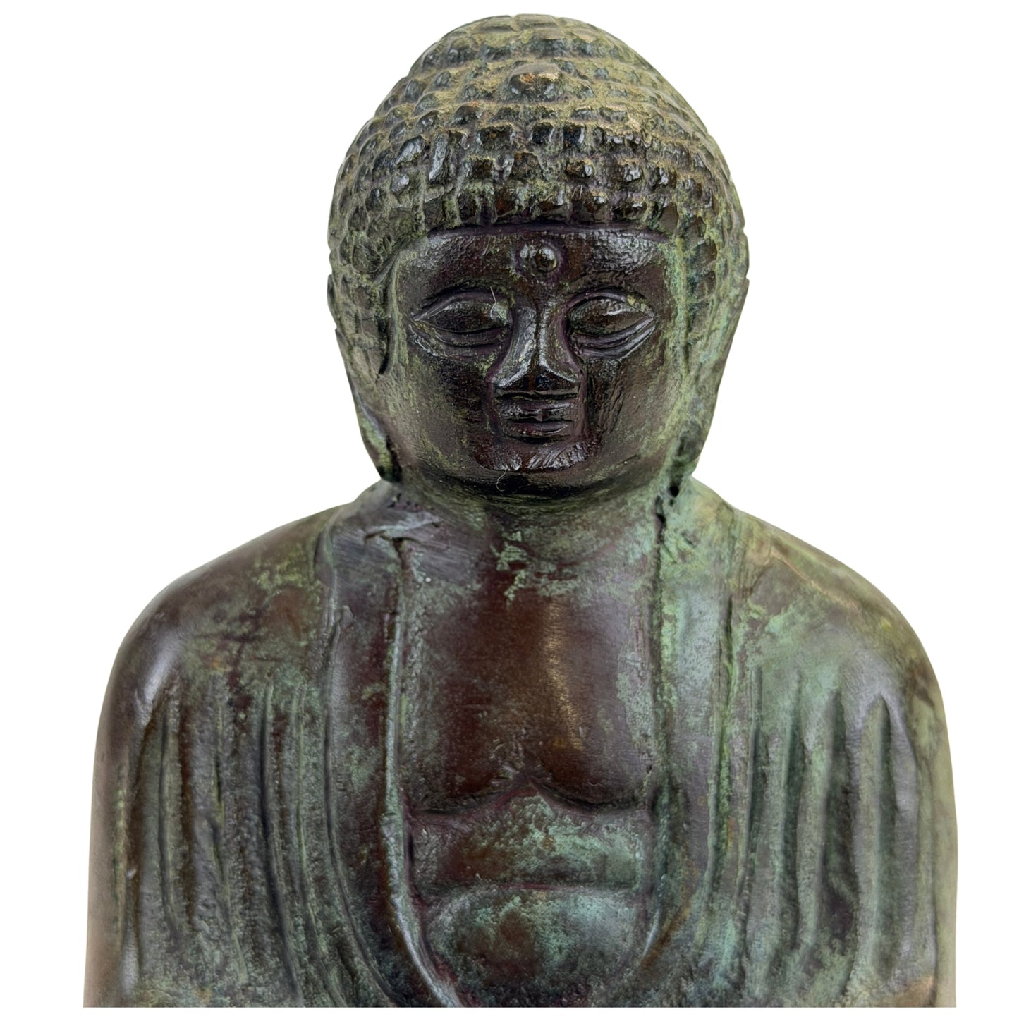 Close view of the Japanese bronze Buddha’s face, patterned hair and upper robe