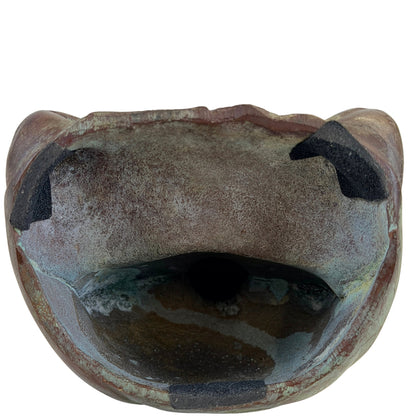 Underside of the Japanese bronze Buddha showing the open hollow-cast construction