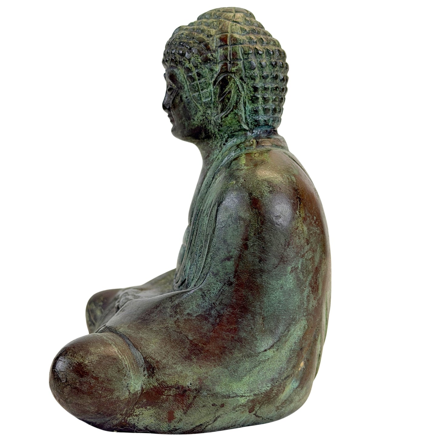 Left profile of the seated bronze Buddha with oxidized surface and patterned hair