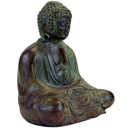 Three-quarter view of the seated Japanese bronze Buddha with brown and green patina