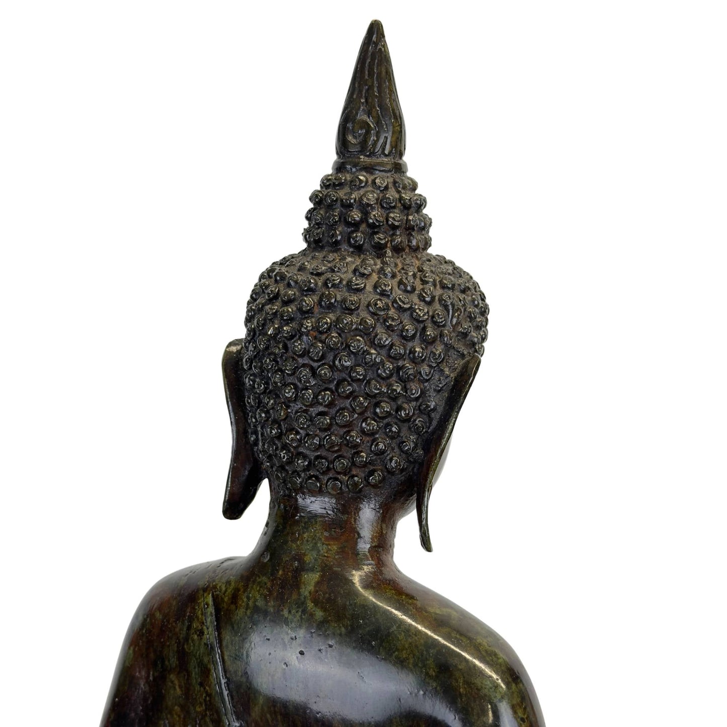 Detailopname van de kruin en de klassieke Javanese haardracht met restanten van prada.