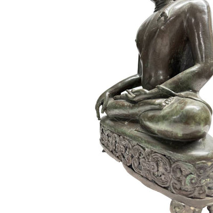 Left side of the openwork throne and resting hand of the antique Lan Na-style Buddha