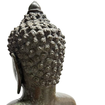 Rear head and aged bronze surface detail of the Lan Na-style Buddha