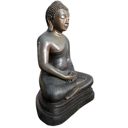 Hands of the large bronze Buddha resting in Dhyana Mudra