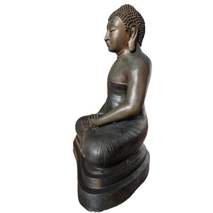 Surface wear and gilding on the large bronze Buddha