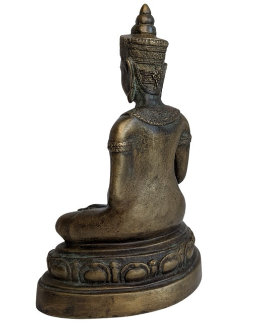 Ornate headgear and calm face of the Thai Buddha