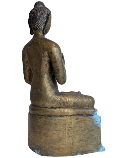 Natural blue-green patina on the bronze Buddha