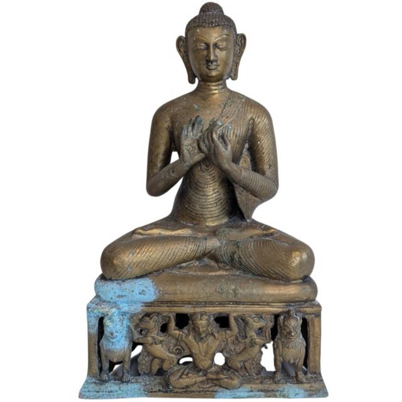 Hands of the Burmese bronze Buddha forming Dharmachakra Mudra