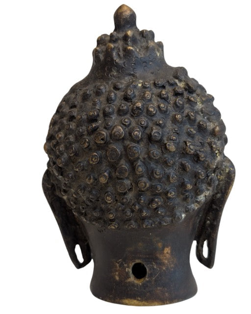 Back of the Buddha head showing the textured hair curls