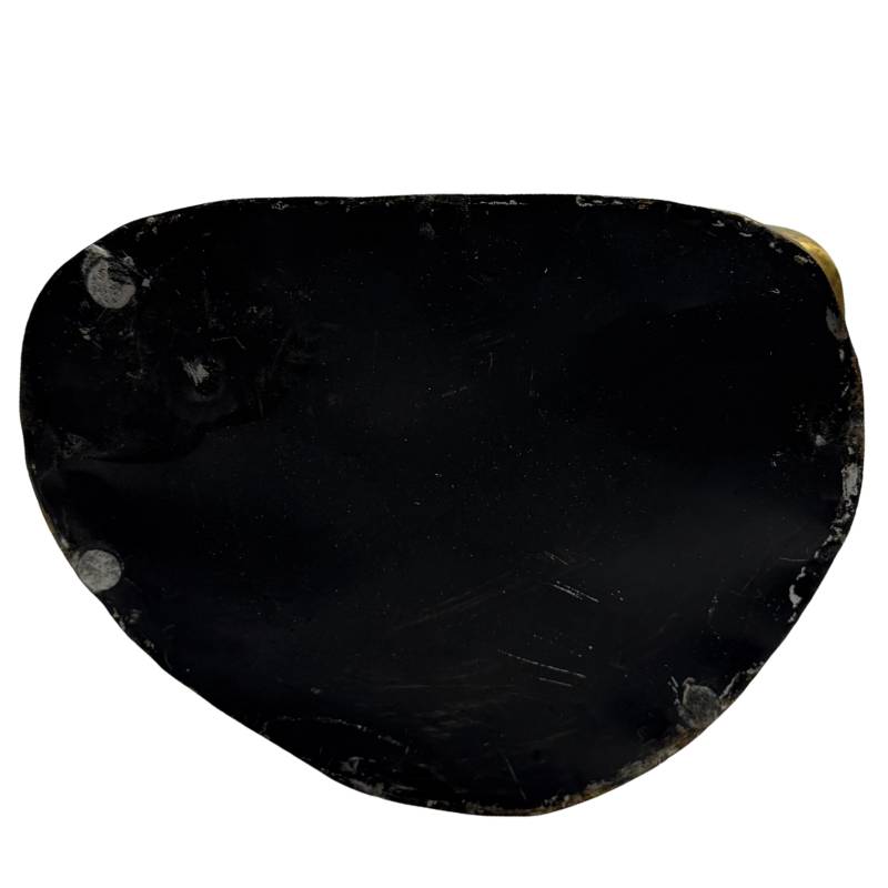Closed black underside of the Chinese bronze Buddha base