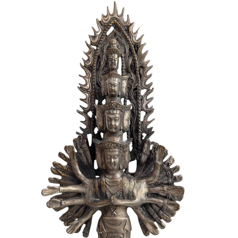 Chinese bronze Guanyin standing within a radiating halo