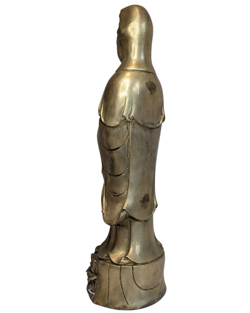 Golden patina and aged surface on the Guanyin bronze