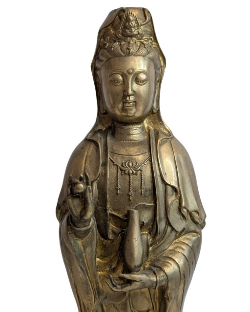 Casting interior visible beneath the Guanyin base